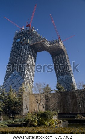 The CCTV Tower, Building, will be one of the largest buildings in Beijing.  It is presently under construction and has a unique design.