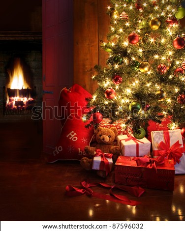 Christmas scene with tree  gifts and fire in background