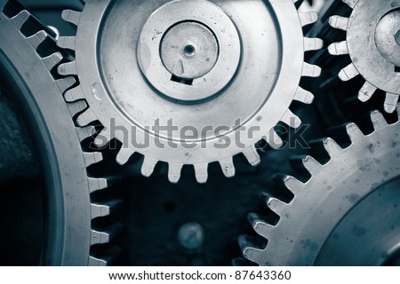 Large cog wheels in the motor. Royalty-Free Stock Photo #87643360