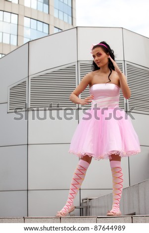 girl in a pink dress in Big City