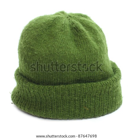 Woolen knit hat for cold weather isolated on white background. Homemade product.