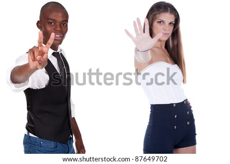 man and woman doing victory and stop signs