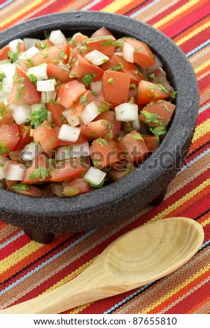 pico de gallo also called salsa fresca, is a fresh, uncooked condiment made from chopped tomato, white onion,cilantro and chilis