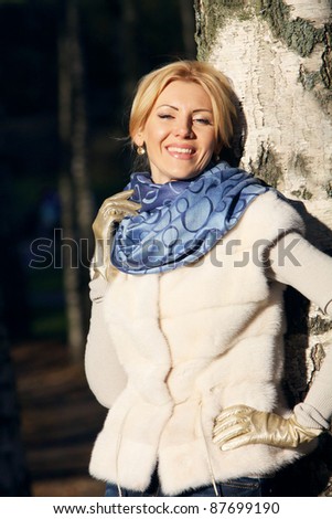 woman  in the waistcoat from a mink in the park