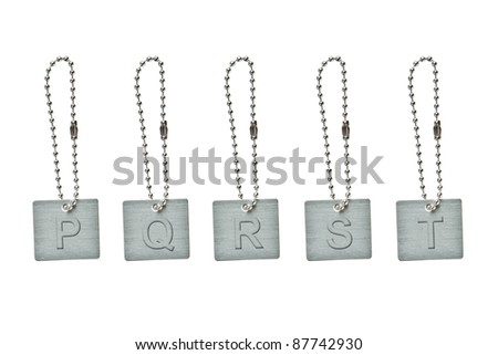 Silver metal key tag with letter P-T