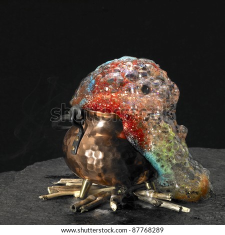 symbolic picture with spumous potion and copper cauldron on a fireplace