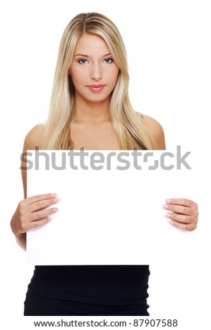 Beautiful young blond business woman is holding blank whiteboard sign. Isolated on white background.