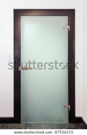 Modern glass  door - wood and frozen glass Royalty-Free Stock Photo #87926515