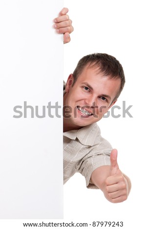 Portrait of man holding empty white board