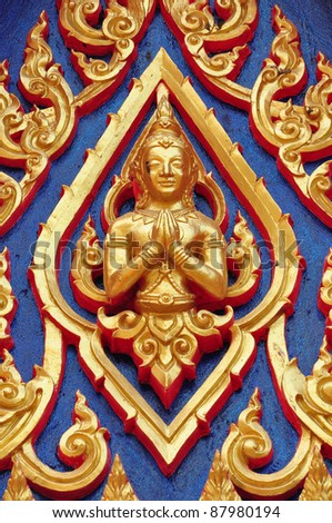 Thai lord Statue on the wall