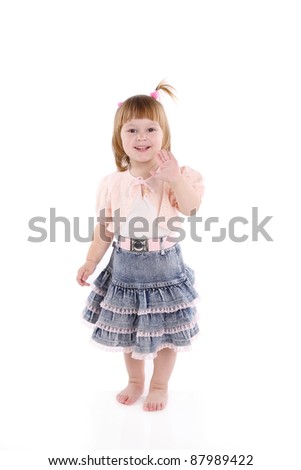 cheerful little girl on a light background.