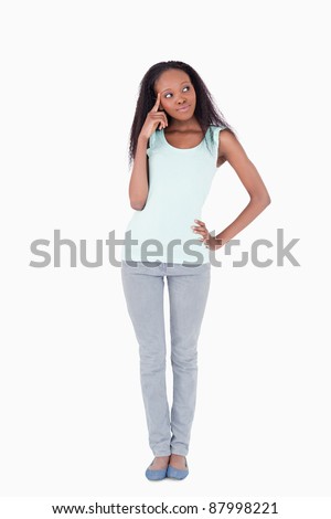 Young woman having an idea on a white background