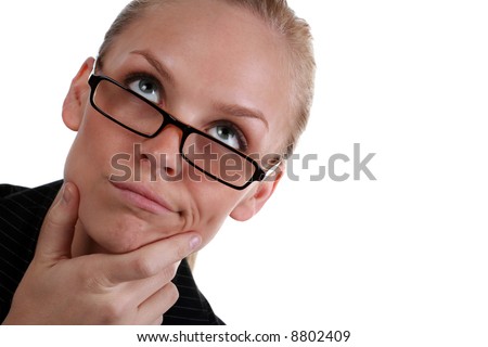 Pretty Business Lady with her hand on her chin making a decision