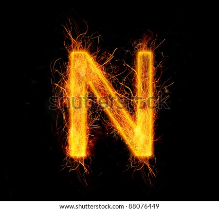 sparkling font: letter N on a dark background