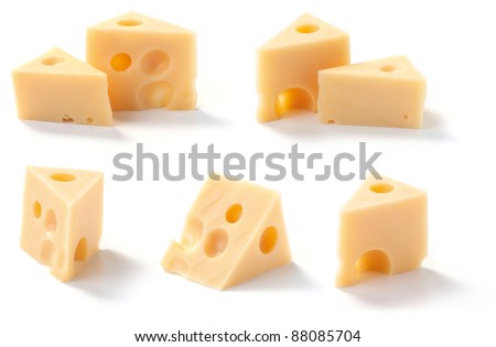 Various pieces of cheese with holes on a white background. Royalty-Free Stock Photo #88085704