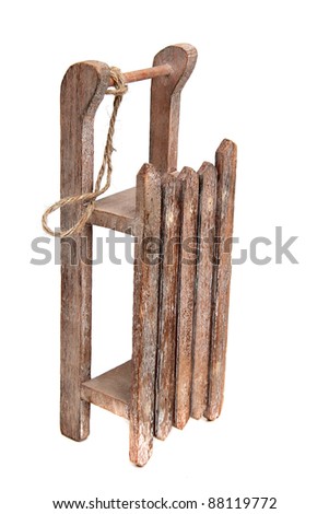 old wooden sledge with rope
