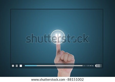 hand push pause button on touch screen to suspend video clip Royalty-Free Stock Photo #88151002