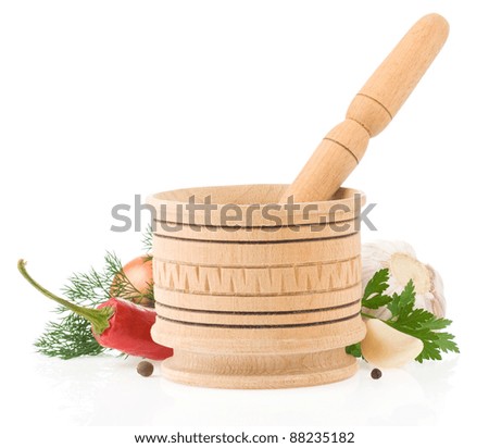 food ingredients and spices in mortar isolated on white background