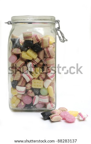 Traditional sweet jar full of colorful candys.