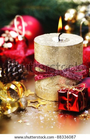 Christmas composition with candle and decorations