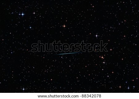 Perseid meteor crossing the starry sky