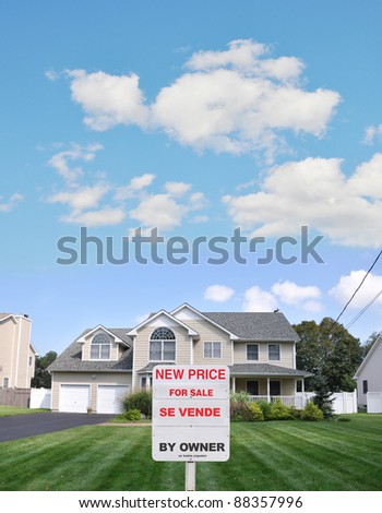Realtor Sign on Front yard lawn of large beautiful two car garage suburban home in residential neighborhood