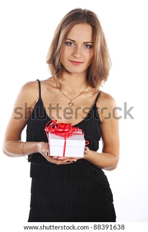Image of happy brunette female holding christmas gift, isolated on white