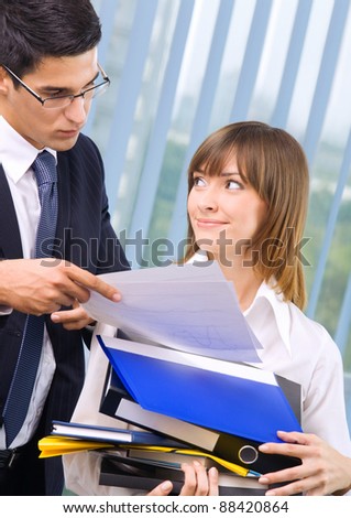 Two business people working at office