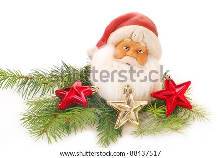christmas decoration with head of santa claus figurine isolated on white