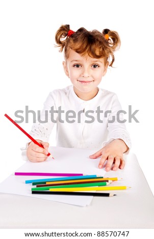 girl draw picture by color pencils isolated on a white background