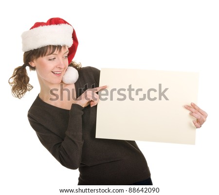 young girl in Santa hat gesturing