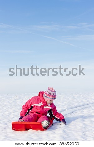 little girl with bob in snow