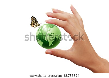 green earth globe in woman hands and butterfly