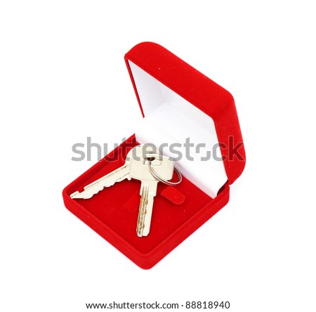 keys in red gift box isolated on white