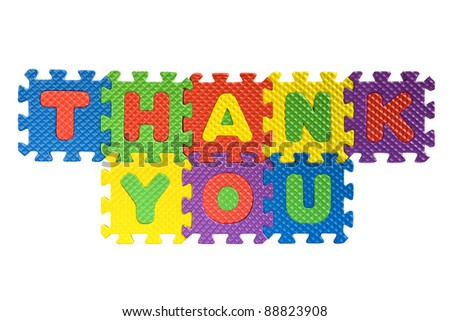 Thank you sign written with alphabet puzzle letters isolated on white background