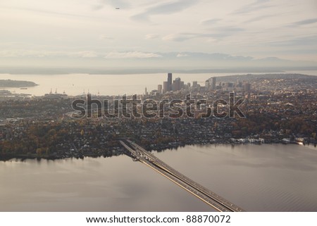 Aerial view of I-90 floating bridge leading into Seattle at sunset