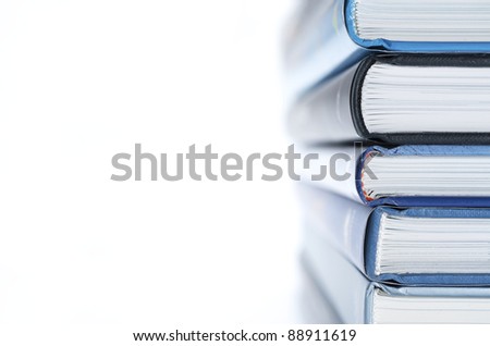 forefront of a group of books stacked Royalty-Free Stock Photo #88911619