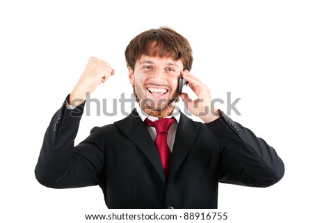 Businessman receiving a pleasant new at the phone