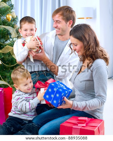 Christmas Family with Gifts at home