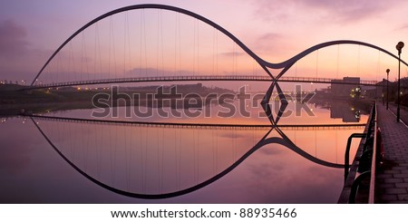 Infinity Bridge in Stockton-on-Tees across the river Tees at sunrise Royalty-Free Stock Photo #88935466