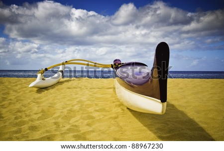Purple Outrigger Canoe on Sandy Beach Overlooking Ocean and Horizon Royalty-Free Stock Photo #88967230