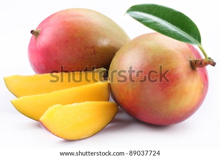 Mango with slices on a white background.