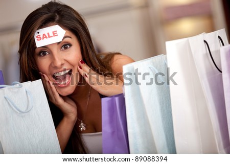Woman at an amazing shopping sale in the mall