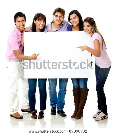 Group of casual people pointing at a banner - isolated over a white background