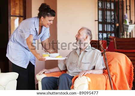 elderly and nurse or carer Royalty-Free Stock Photo #89095477