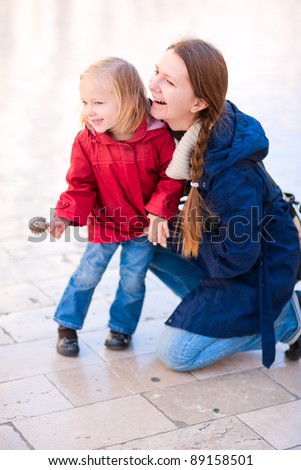 Happy Mother and daughter outdoors portrait