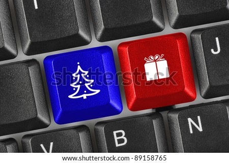 Computer keyboard with Christmas keys - holiday concept