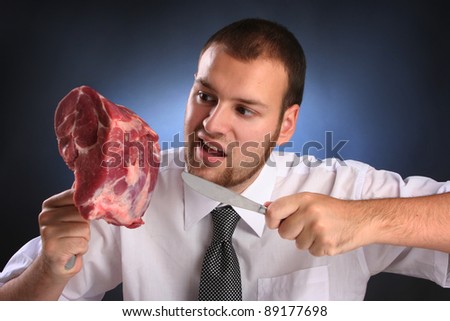 eccentric guy eating red meat Royalty-Free Stock Photo #89177698