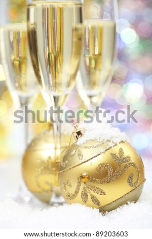 christmas ball with champagne on abstract light background,Shallow Dof.