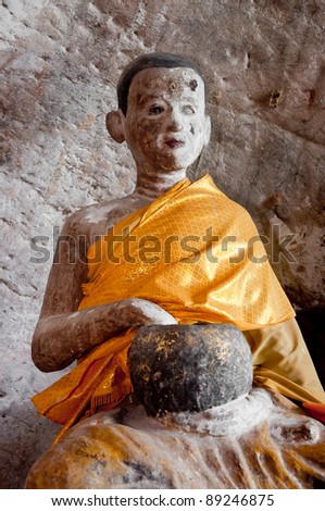ancient buddha statue in yala cave temple, thailand
